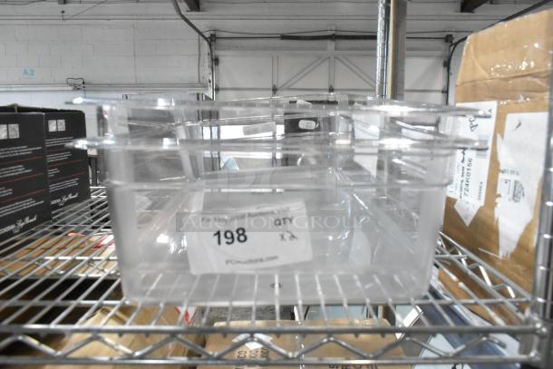Two brand new Cambro 16CW135 Camwear® full-size clear polycarbonate food pans, 6" deep, with visible scratch and dent. Quantity: 2.