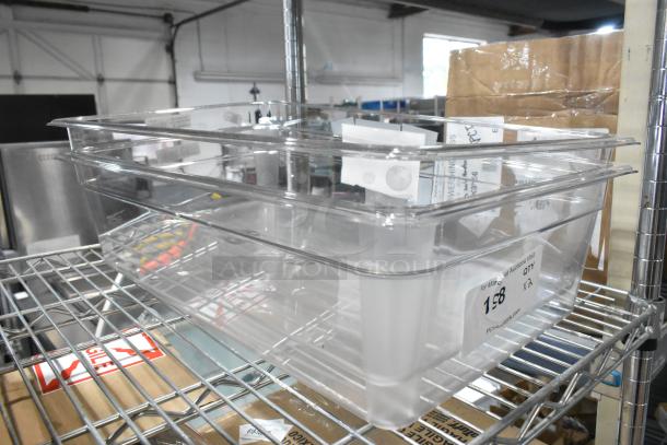2 new Cambro 16CW135 Camwear® clear polycarbonate food pans, full size, 6" deep, scratch and dent, on metal shelf.