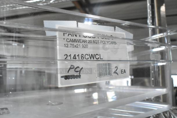 Two Cambro 16CW135 Camwear® full-size clear polycarbonate food pans, 6" deep. Item code 21416CWCL. New with minor scratches.