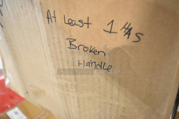 Cardboard box with handwritten note reading "At least 1 has broken handle." Contains new and scratch/dent items like Tablecraft SGJ6 jars and Acopa mugs.