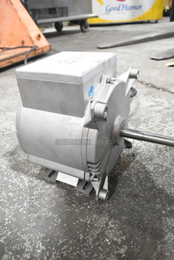 Brand new Nidec 2799 1573 motor, 115-120V, 1 phase, scratch and dent condition with visible label.