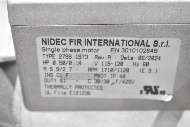 Brand new Nidec 2799 1573 motor, 115-120V, 1 phase. Label indicates type, voltage, and protection status. Minor scratches.