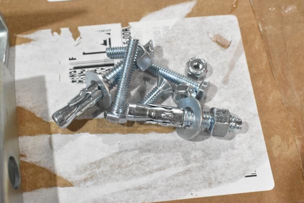Brand new Curtron K0717 zinc lower hinge assembly kit, model 724K0156. Includes bolts, nuts, and washers. Scratch and dent condition.