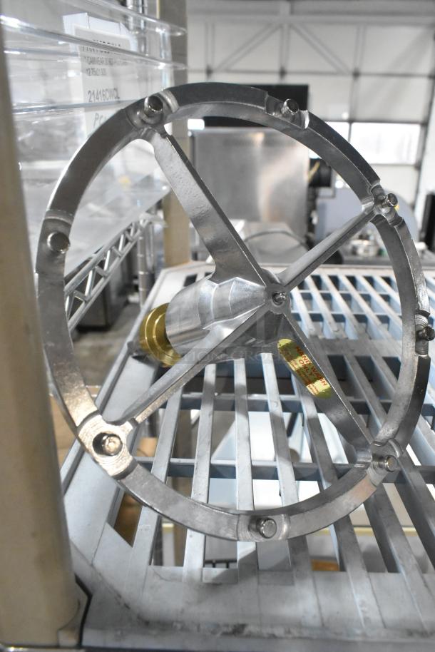 New metal commercial Pelican Head S Blade and Blade Frame. Scratch and dent condition. Includes label markings.