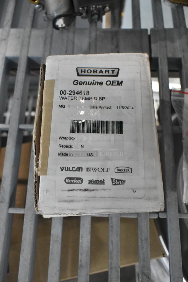 Box labeled Hobart Genuine OEM 00-294618 Water Temperature Dispenser, made in the US.