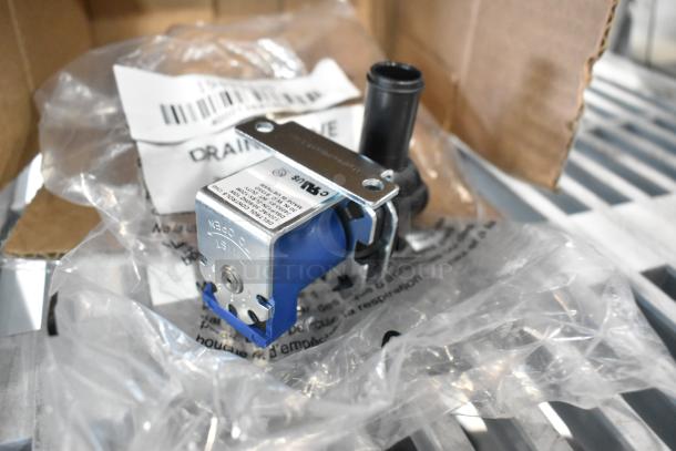 Brand new drain valve for Avantco Ice machines, shown in packaging. Includes labels and installation instructions.