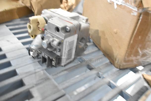 Four new scratch and dent items: Hobart temperature control kit, MainStreet Equipment thermostat knob, Avantco Ice drain valve, and Robertshaw gas valve.
