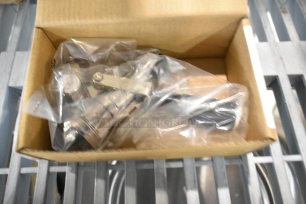 Brand new Avantco 178COUPLER "D" system beer keg couplers in box, slight scratches, three total, in sealed packaging.