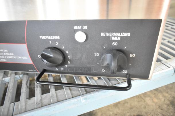 BRAND NEW Vollrath TW-27R stainless steel food warmer with temperature and timer controls, 120V, 1-phase, scratch and dent condition.