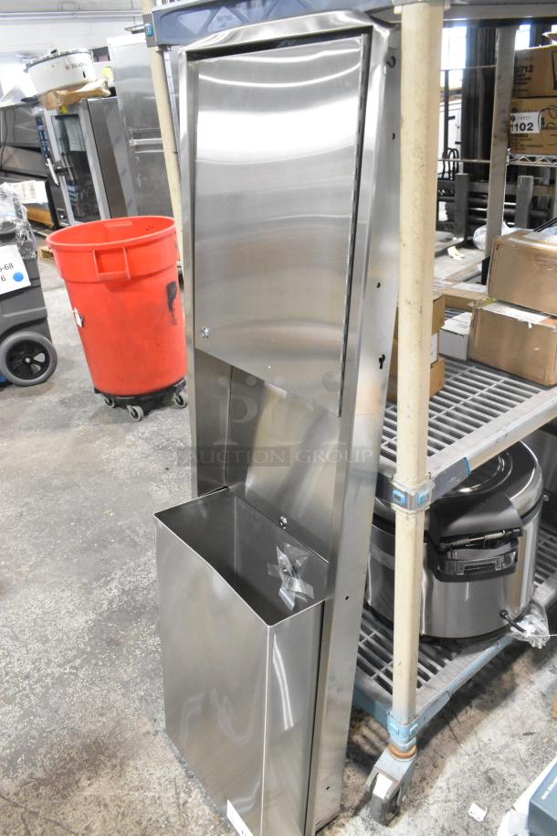 Brand new stainless steel wall mount trash and towel dispenser with minor scratches. Robust design, ready for installation.