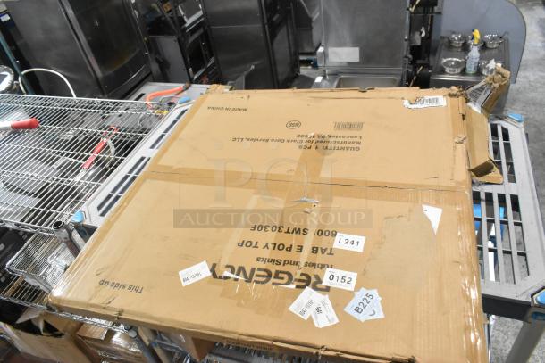 Boxed Regency 600PSWT3030F 30" x 30" poly table top, new with scratch and dent. Multiple labels and tape visible.