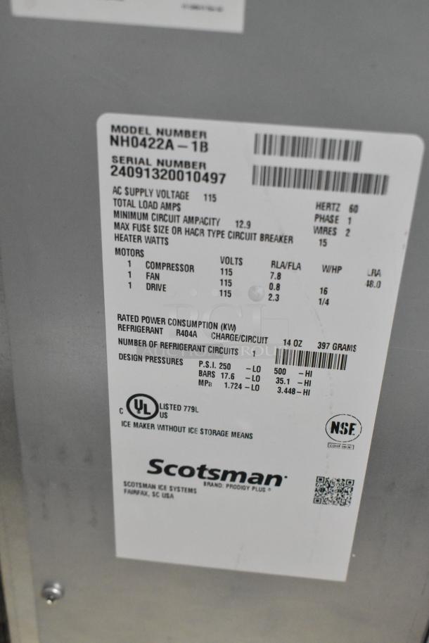 Alt text: Scotsman NH0422A-1B Prodigy Plus Series stainless steel ice machine with product label showing model, voltage, and specifications.