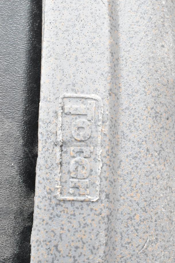 Set of 8 grey poly trash cans, rugged texture. Includes faded marking "Toters." Auction is for all 8 units.