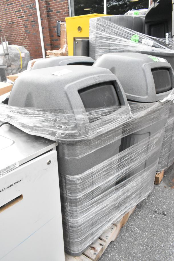 Three gray poly trash cans wrapped on a pallet, new condition, ideal for outdoor use, labeled for auction.