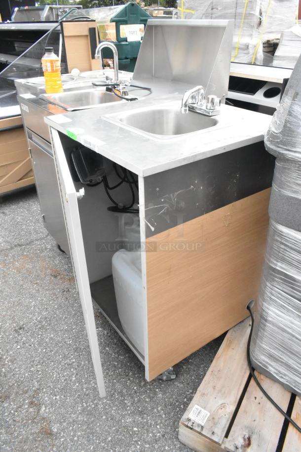 Stainless steel single bay portable sink with faucet, commercial casters, and storage; ideal for catering or events.