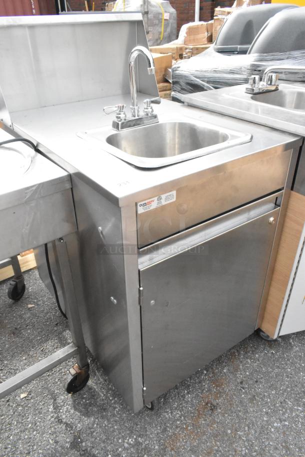 QualServ WMSC24MS stainless steel portable sink, single bay, on commercial casters. Includes faucet and labeled storage.