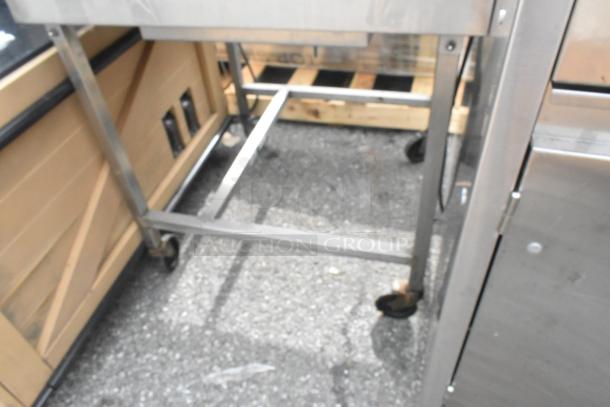 Belshaw H&I-4 stainless steel commercial heat and ice station, 208 volts, 1 phase. Sturdy, wheeled base.