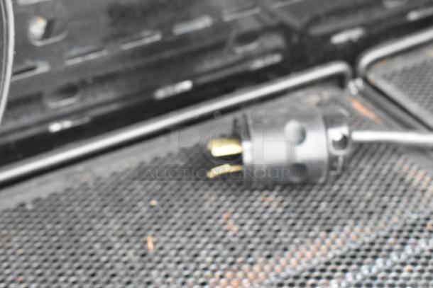 Killion Metal Commercial Open Grab N Go Merchandiser plug, 208/230V, 1 phase, shown in black metal housing with plug detail.