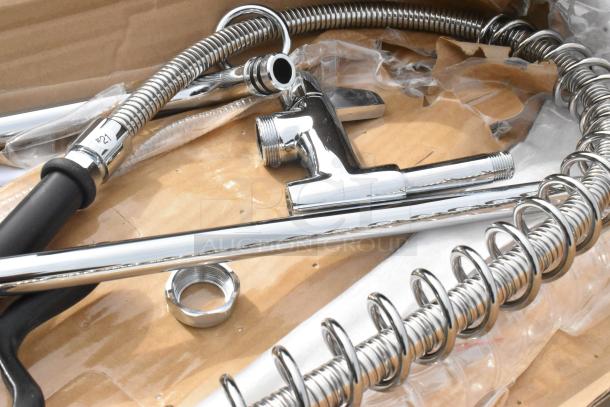 BRAND NEW Equip 5PR-8W12-C Pre Rinse Set, chrome finish, minor scratches, complete with hose and fittings, unused condition.
