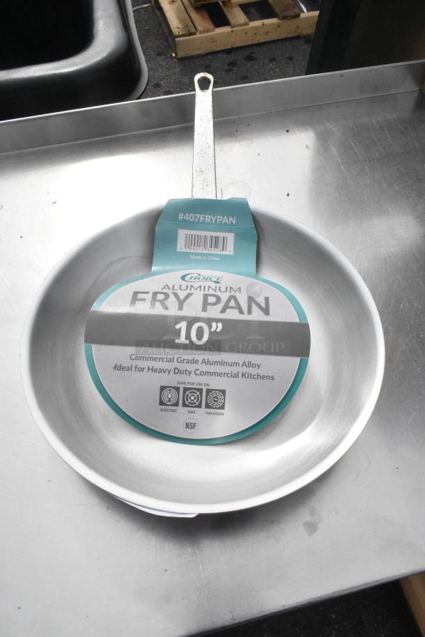 Choice 10" aluminum fry pan, commercial grade, scratch and dent, NSF certified, #407FRYPAN tag visible.