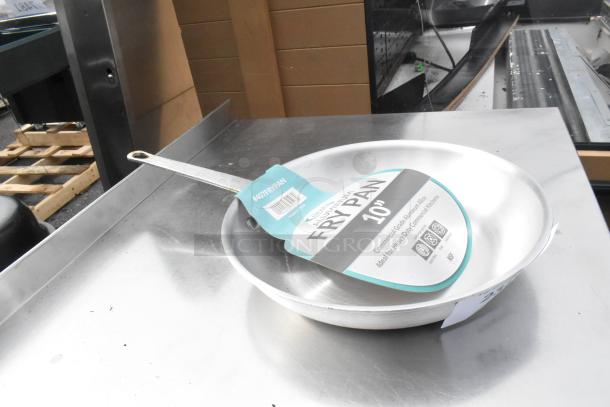 BRAND NEW Choice 10" Aluminum Fry Pan with tag, minor scratches visible, commercial-grade quality.