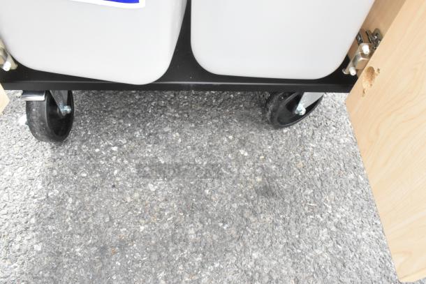 Brand new Ozark River CHSTM-AB-AB1N portable hot water sink, maple laminate, scratch and dent condition, on casters.