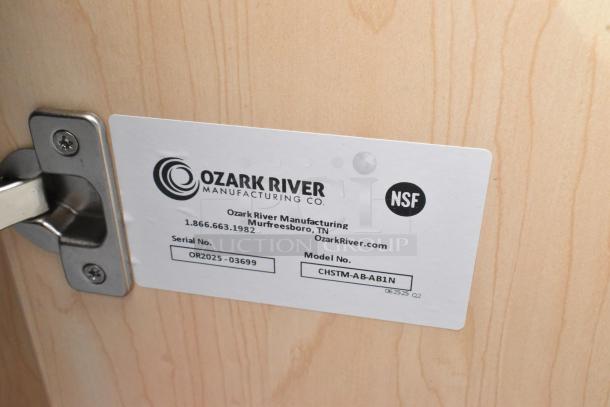 "Label on Ozark River Manufacturing Lil Premier Maple Portable Hand Sink showing model CHSTM-AB-AB1N, NSF certified."