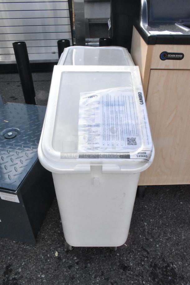 Brand new Cambro IBS20148 21-gallon white ingredient bin, slant top, 2-piece sliding lid, minor scratches, on wheels.