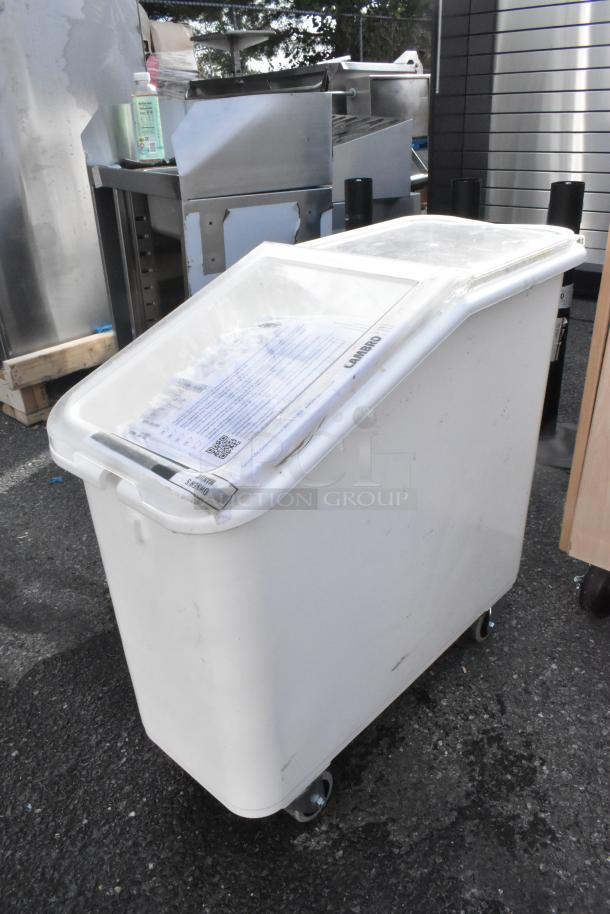 BRAND NEW Cambro IBS20148 21 Gallon White Slant Top Mobile Ingredient Bin with 2-Piece Sliding Lid, slight scratches visible.