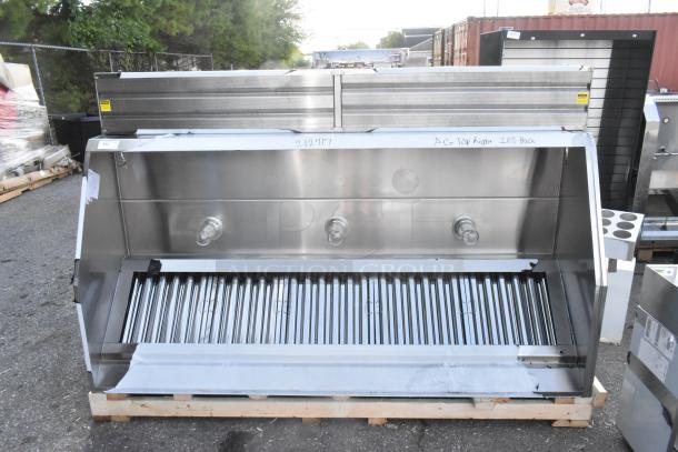 Clark stainless steel commercial grease hood with make-up air vent, brand new condition, minor dents visible.