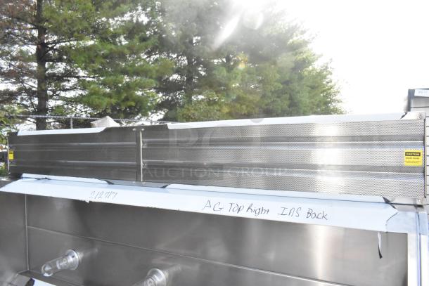 Clark stainless steel commercial grease hood with makeup air vent. Brand new, slight scratches. Caution label visible.