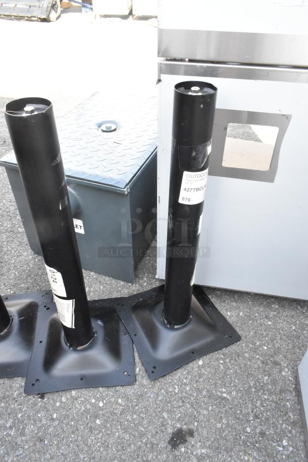 4 new 427TBCLRD325 Lancaster Table & Seating Excalibur 3" outdoor table bases, minor scratches, black finish, labeled.