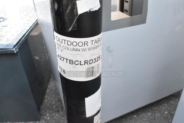 Brand new 427TBCLRD325 Lancaster outdoor table base column with visible label, 3" height. Scratch and dent condition.
