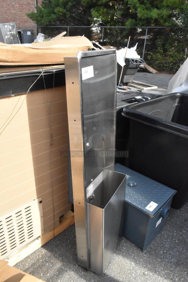 Brand new stainless steel wall mount trash and towel dispenser, scratch and dent condition, with label "249".