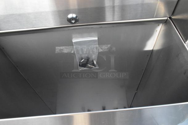 Brand new stainless steel wall mount trash and towel dispenser, slight scratches, includes key set.