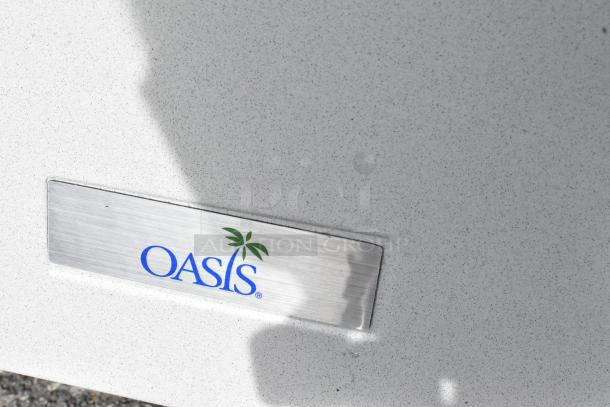 Alt text: Oasis label on Greystone bi-level drinking fountain model PG8ACSL-SK310, part of Versacooler II series.