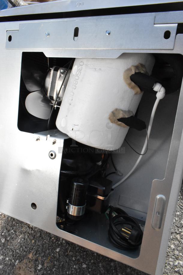Close-up of internal components of Oasis PG8ACSL-SK310 Versacooler II, showing fan and wiring. New, scratch and dent condition.