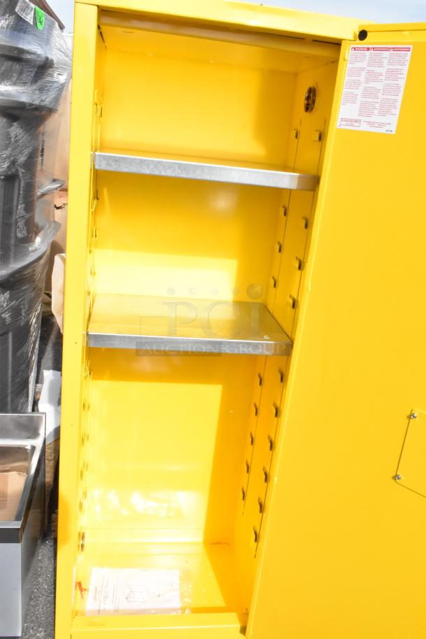 Brand new Durham Mfg 22-gallon steel flammable liquids storage cabinet, model 1022M-50, yellow, manual door, slight scratches.