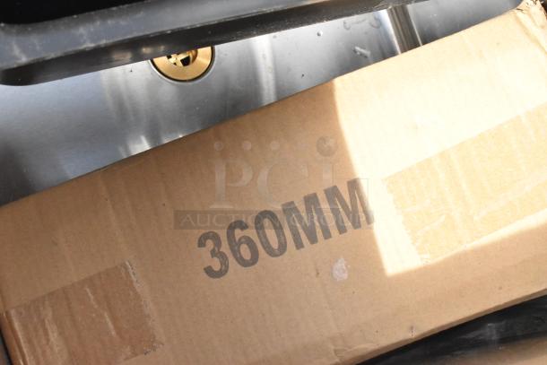 Regency stainless steel sliding lid for 18"x24" underbar ice bin, scratch and dent condition, box marked 360MM.