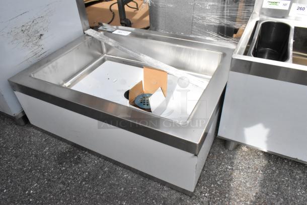 BRAND NEW SCRATCH AND DENT Regency 600SM20286 Stainless Steel Mop Sink, 33", 16-Gauge, 28"x20"x6" Bowl, visible scratches.