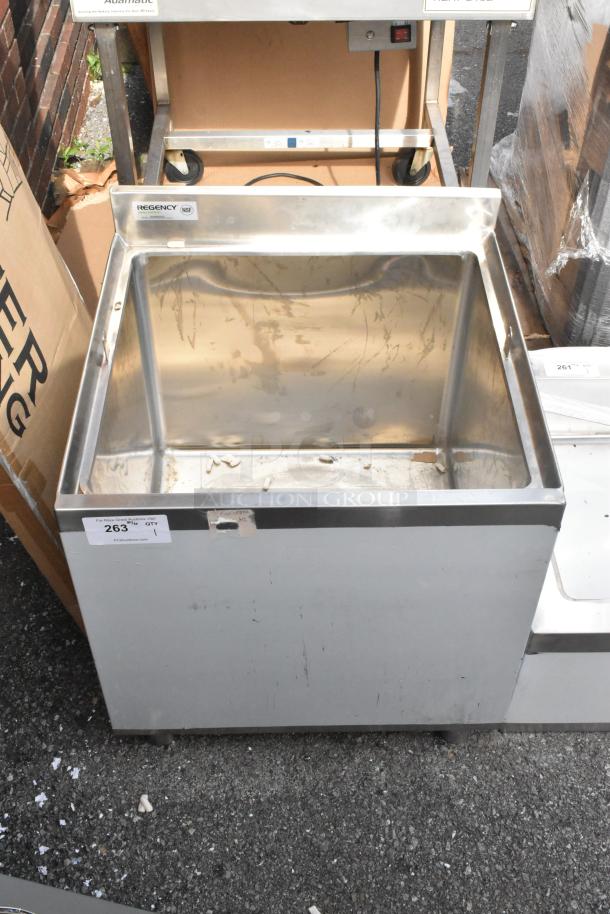 Brand new Regency 600BB2424 stainless steel beer box with 3" backsplash, 24"x24", no legs, visible scratch and dent marks.