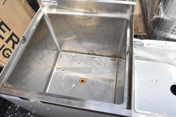 Brand new Regency 600BB2424 beer box, stainless steel, 24"x24" with 3" backsplash, no legs, slight scratches visible.