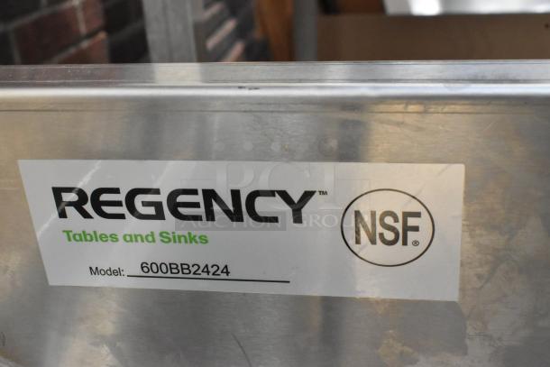 BRAND NEW Regency 600BB2424 stainless steel beer box with 3" backsplash, no legs, Model 600BB2424 label visible.