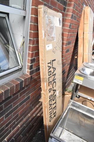Brand new scratch and dent 18"x72" Lancaster Table & Seating folding table in box. Some packaging wear.