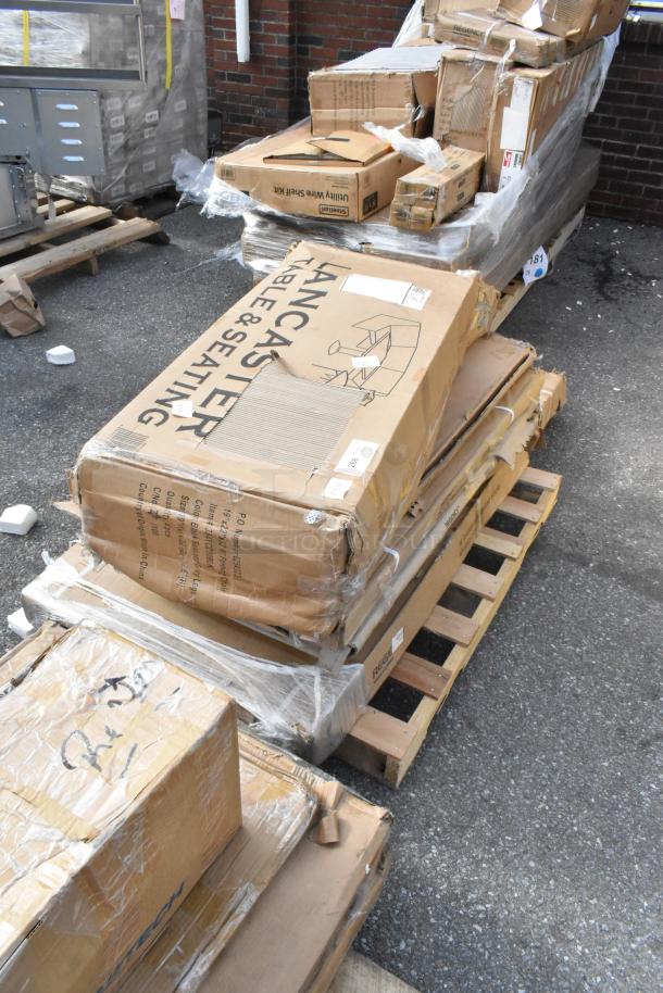 Auction lot with 8 new scratch and dent items, including a Lancaster folding table, equipment stand. Boxes show wear.