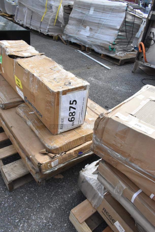 Pallets of boxes labeled "Resale" and "6875," containing scratch and dent items like evaporator coil and tabletops.