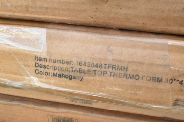 Cardboard box labeled "Item number: 1643048TFRMH, Description: Table Top Thermo Form 30"x48", Color: Mahogany."