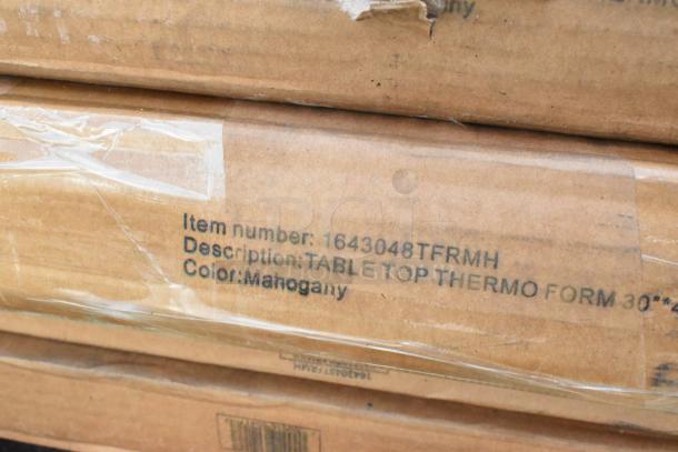 Set of 8 new scratch and dent items including evaporator coil and tabletops. Box label shows item number 1643048TFRMH, mahogany color.