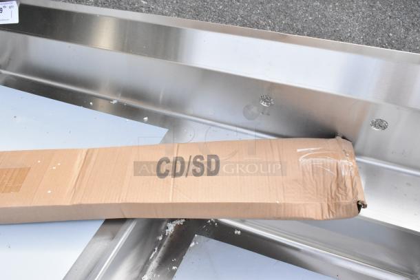 Brand new Regency 50" 16-gauge stainless steel undercounter dishtable, sink on right. Scratch and dent condition. Box marked CD/SD.