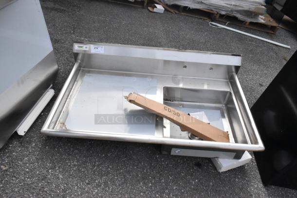 Brand new Regency 50" stainless steel undercounter dishtable, 16-gauge, right sink, visible scratches and dents, model 600UDT50R.